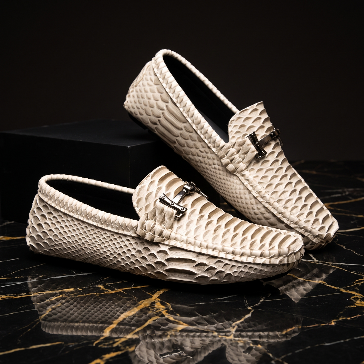 Textured loafers with front buckle detail and flat soles