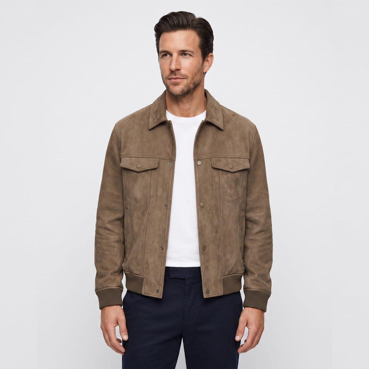 Men's plain trucker jacket with point collar, snap front, chest pockets and ribbed hems