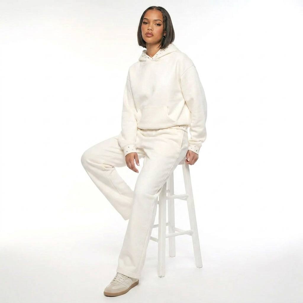 Women's white hooded lounge set with dotted trim and full-length trousers