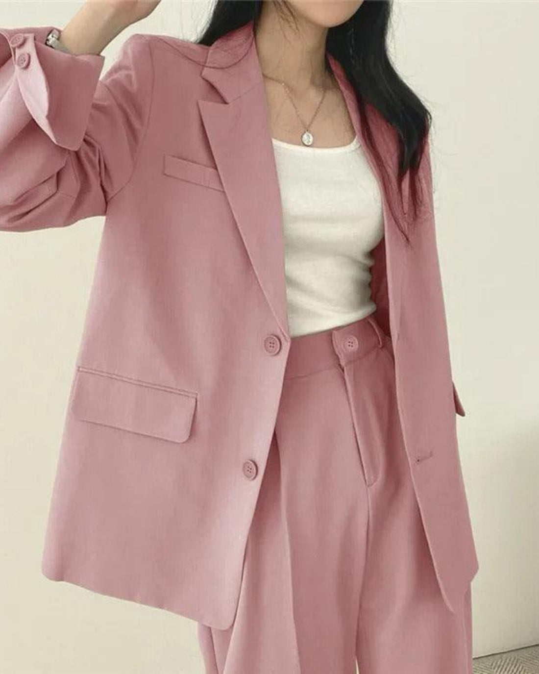 Women's oversized trouser suit set with long blazer and wide-leg trousers