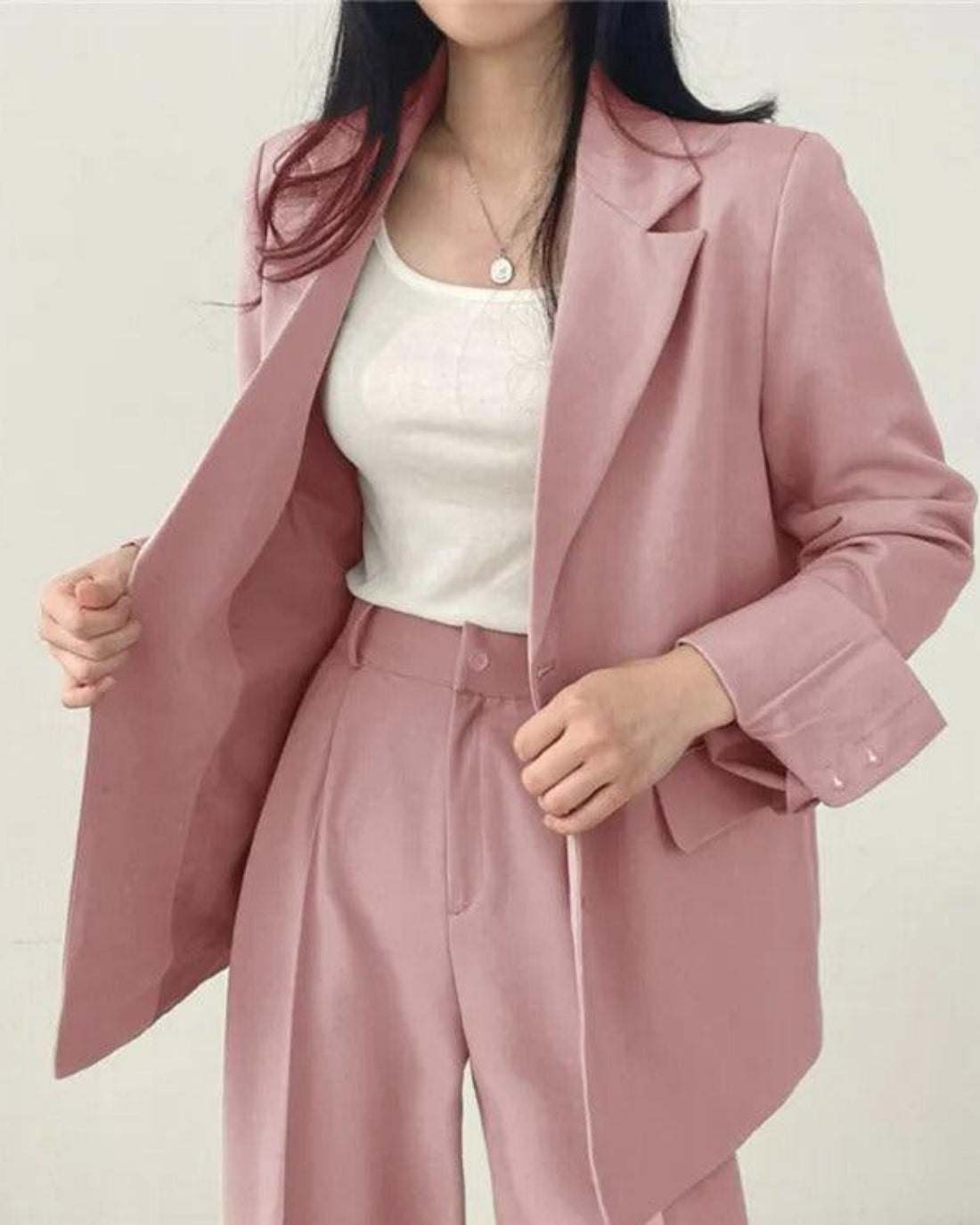 Women's oversized trouser suit set with long blazer and wide-leg trousers