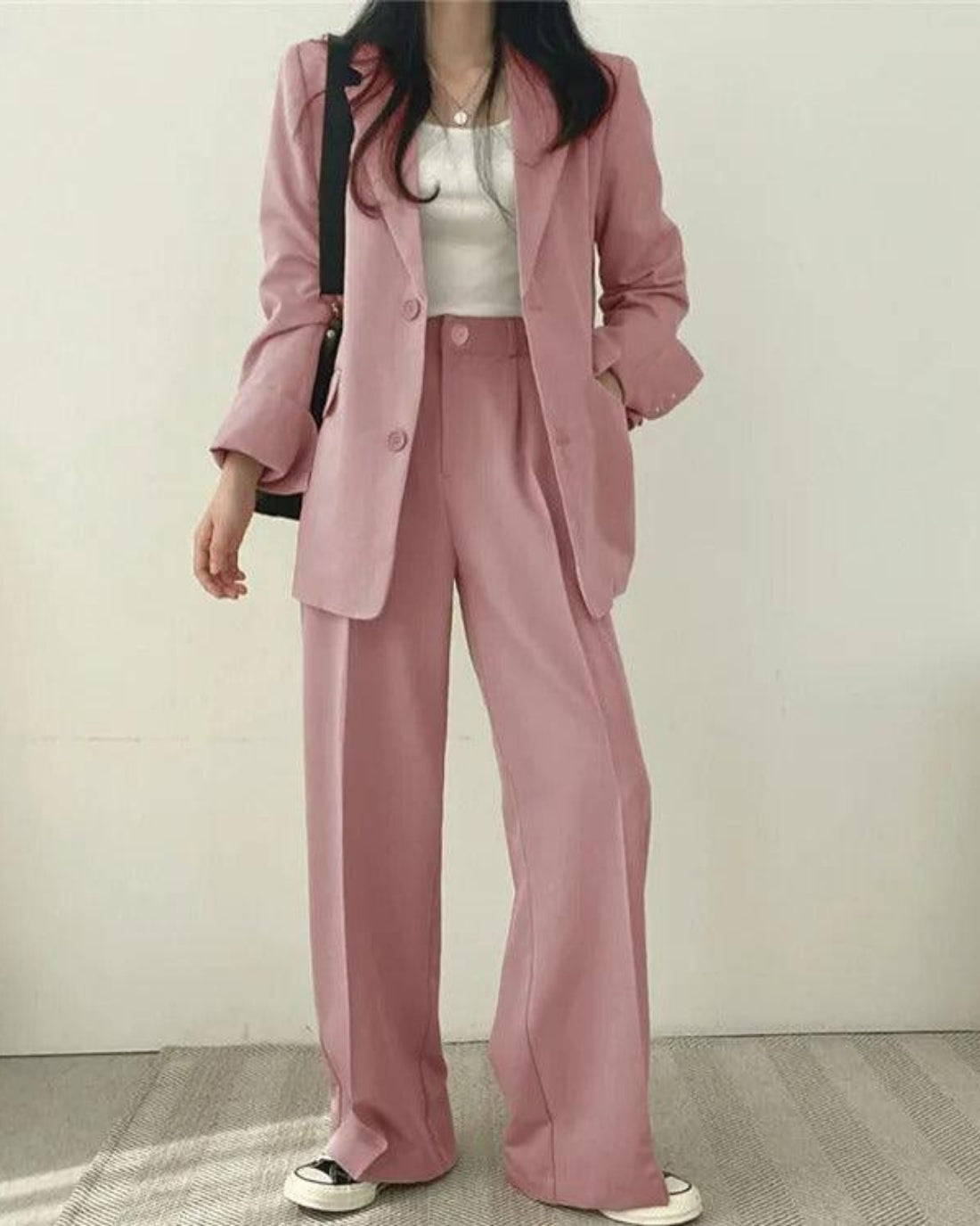 Women's oversized trouser suit set with long blazer and wide-leg trousers