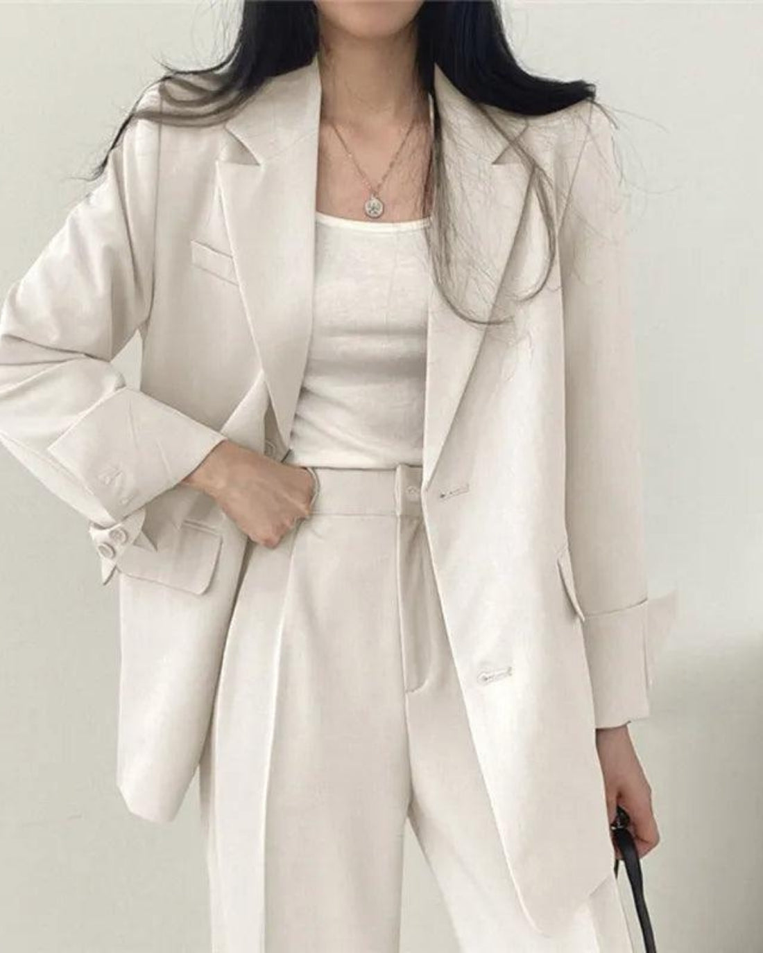 Women's oversized trouser suit set with long blazer and wide-leg trousers