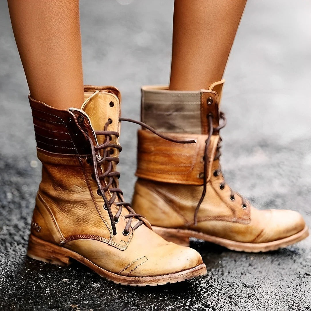 Women's lace-up combat ankle boots with rounded toes, ankle straps and low heels
