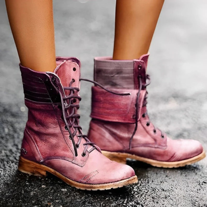 Women's lace-up combat ankle boots with rounded toes, ankle straps and low heels