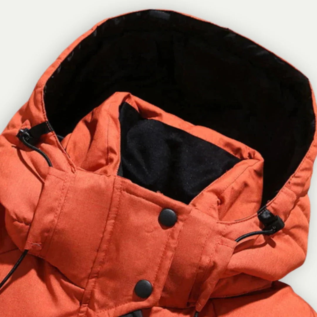 Men's hooded quilted puffer jacket with zip pockets and adjustable cuffs