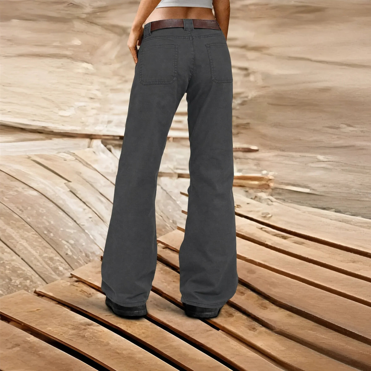 Women's wide-leg cargo trousers with utility pockets and belt loops