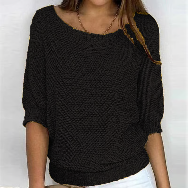 Women's relaxed plain knit sweater with round neckline and three-quarter sleeves