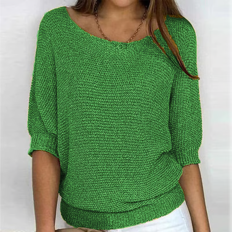 Women's relaxed plain knit sweater with round neckline and three-quarter sleeves