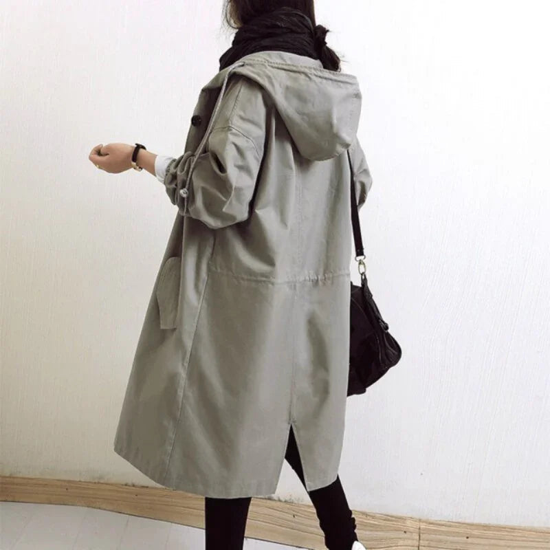 Women's long hooded trench coat with button front and side pockets