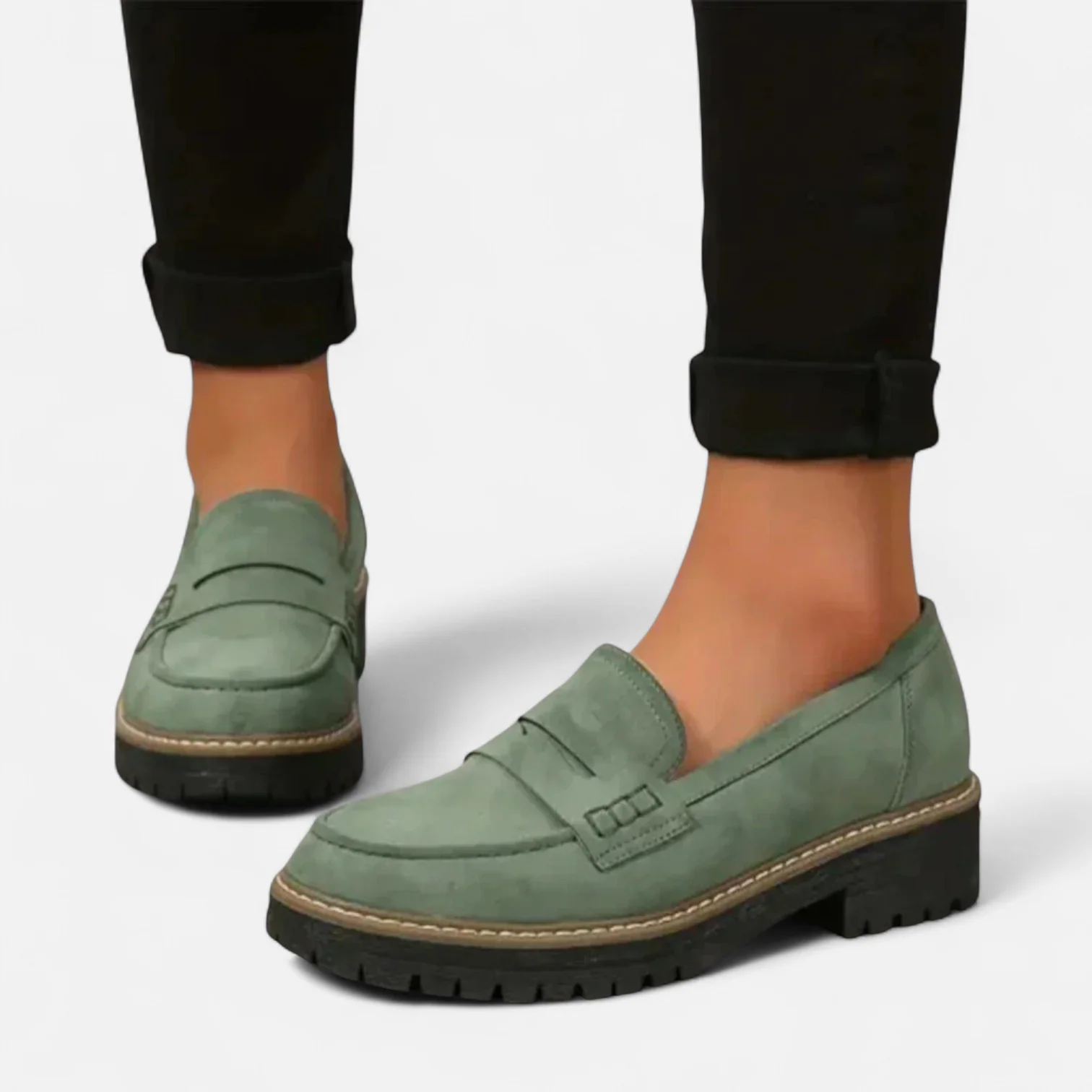 Women's penny loafers with rounded toes and chunky lug soles