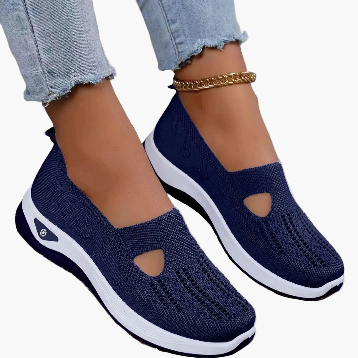 Women's slip-on trainers with textured upper, cut-out detail and white sole