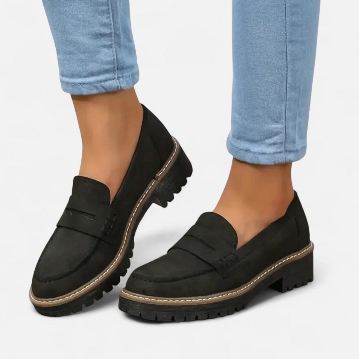 Women's penny loafers with rounded toes and chunky lug soles