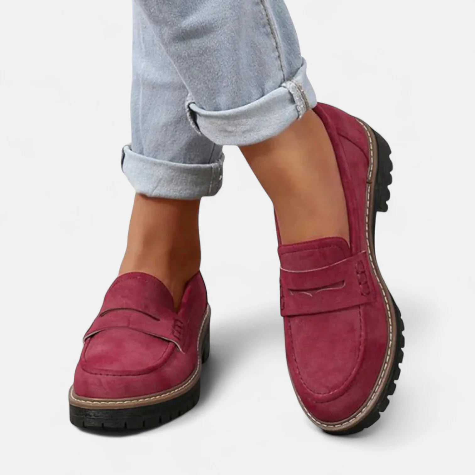 Women's penny loafers with rounded toes and chunky lug soles