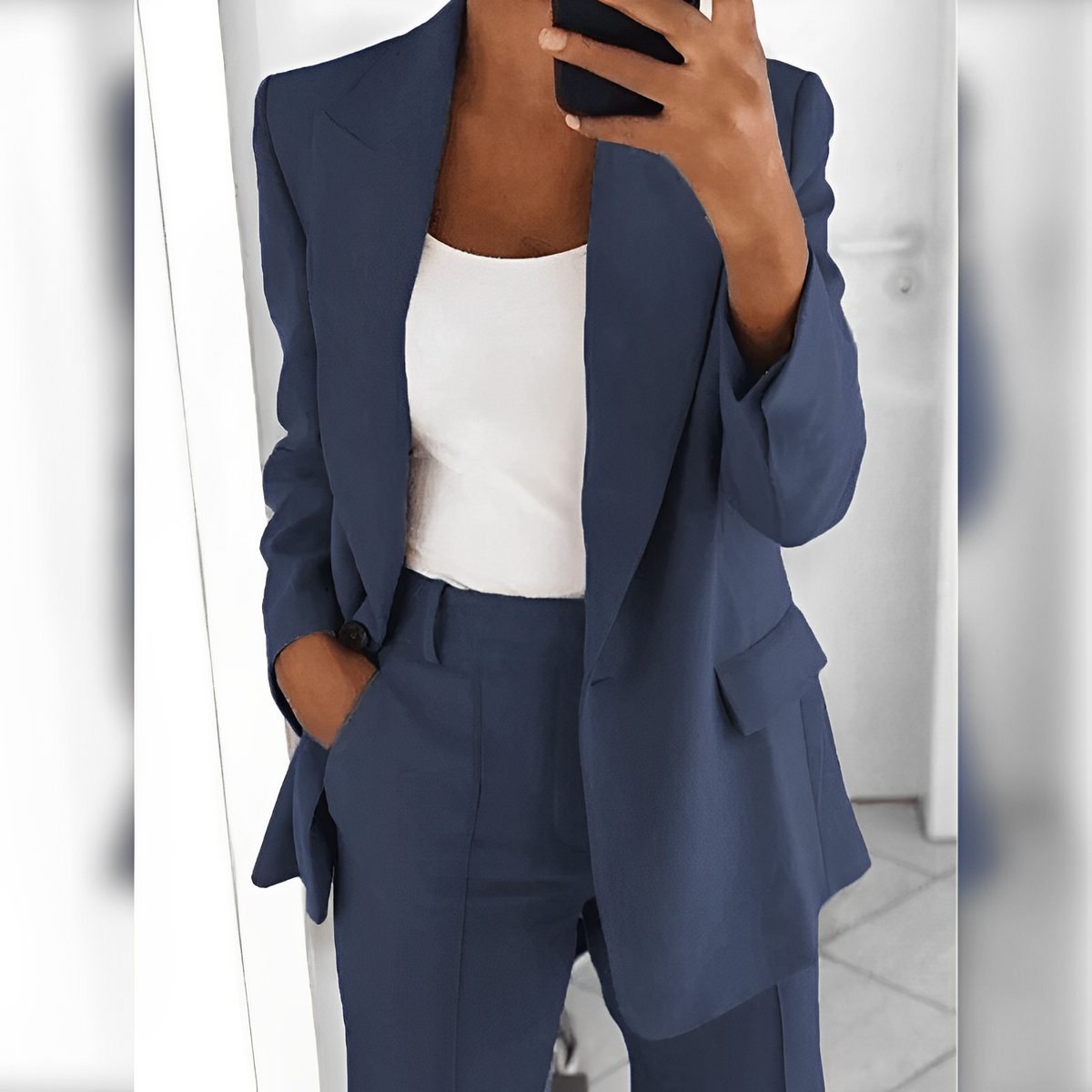 Women's tailored trouser suit set with notched-lapel blazer and matching trousers