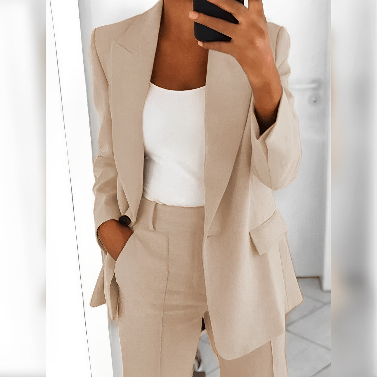 Women's tailored trouser suit set with notched-lapel blazer and matching trousers
