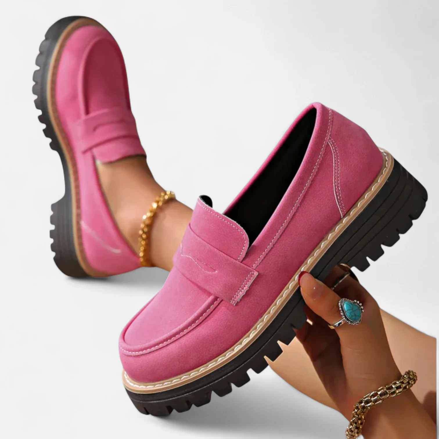Women's penny loafers with rounded toes and chunky lug soles