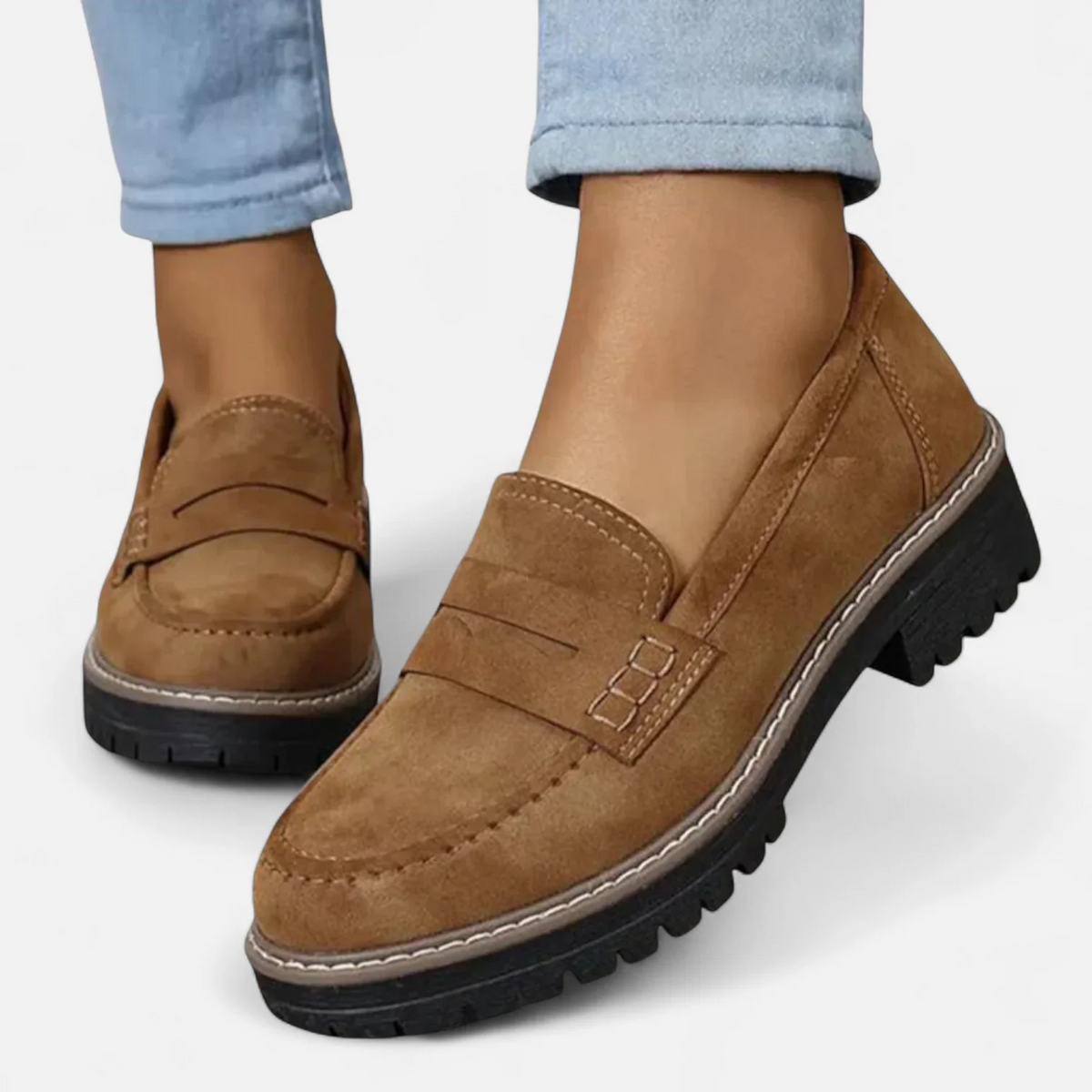 Women's penny loafers with rounded toes and chunky lug soles