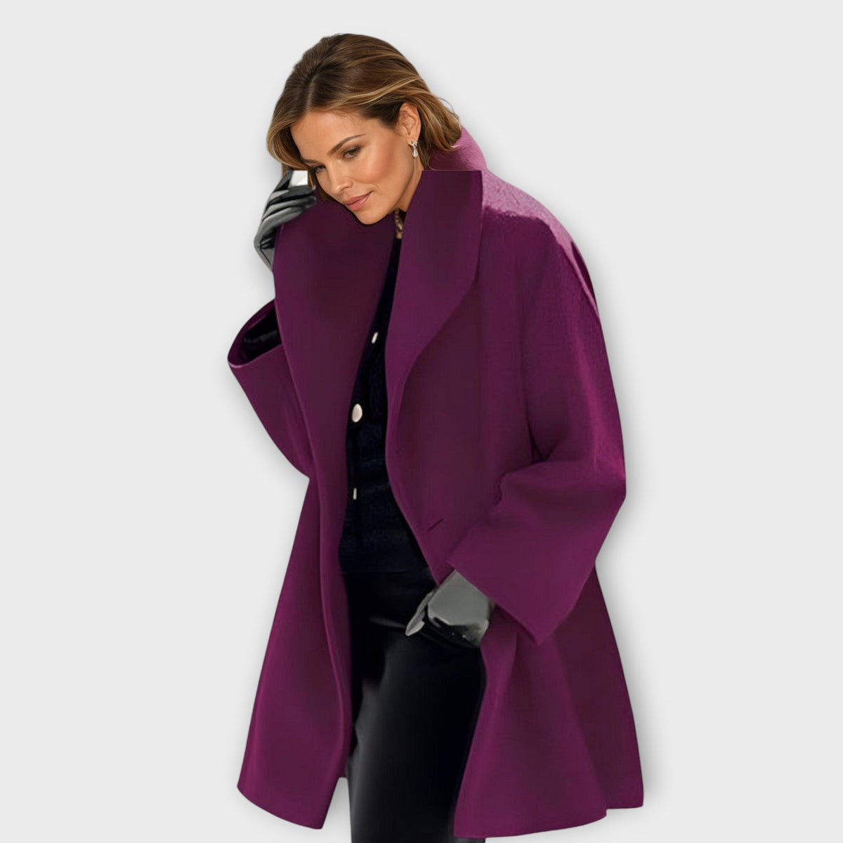 Women's longline overcoat with wide lapels, long sleeves and front pockets