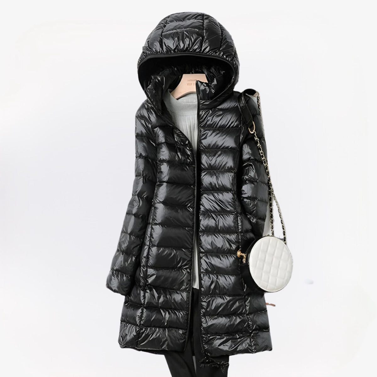 Women's quilted longline hooded puffer coat with zip front