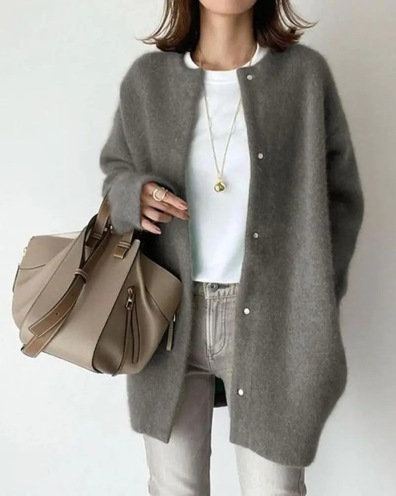 Women's longline button-front cardigan with round neckline and long sleeves