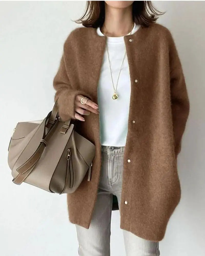 Women's longline button-front cardigan with round neckline and long sleeves