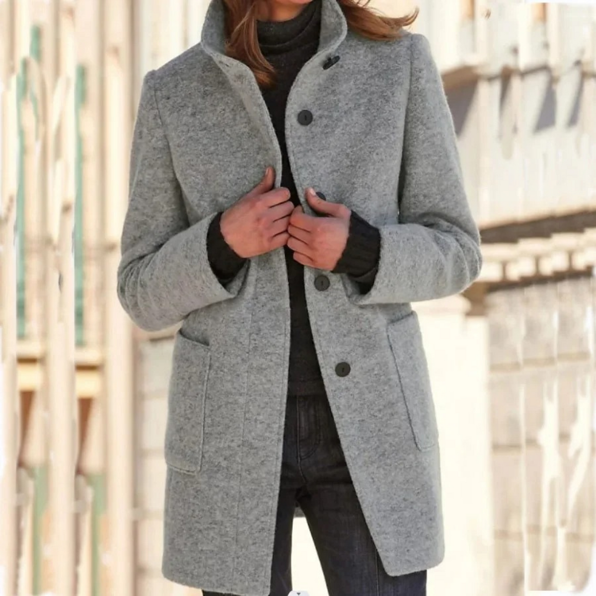 Women's longline coat with stand collar, button front and patch pockets