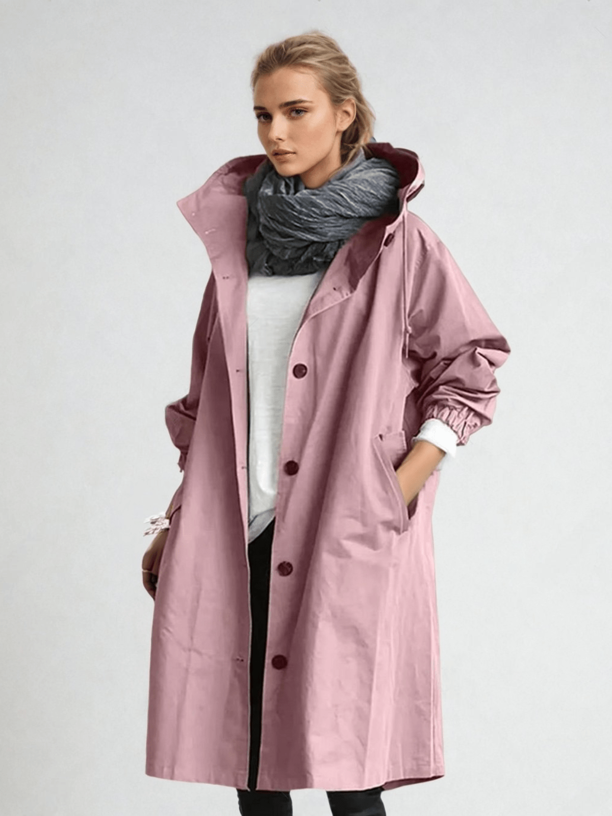 Women's longline hooded trench coat with button front and elasticated cuffs