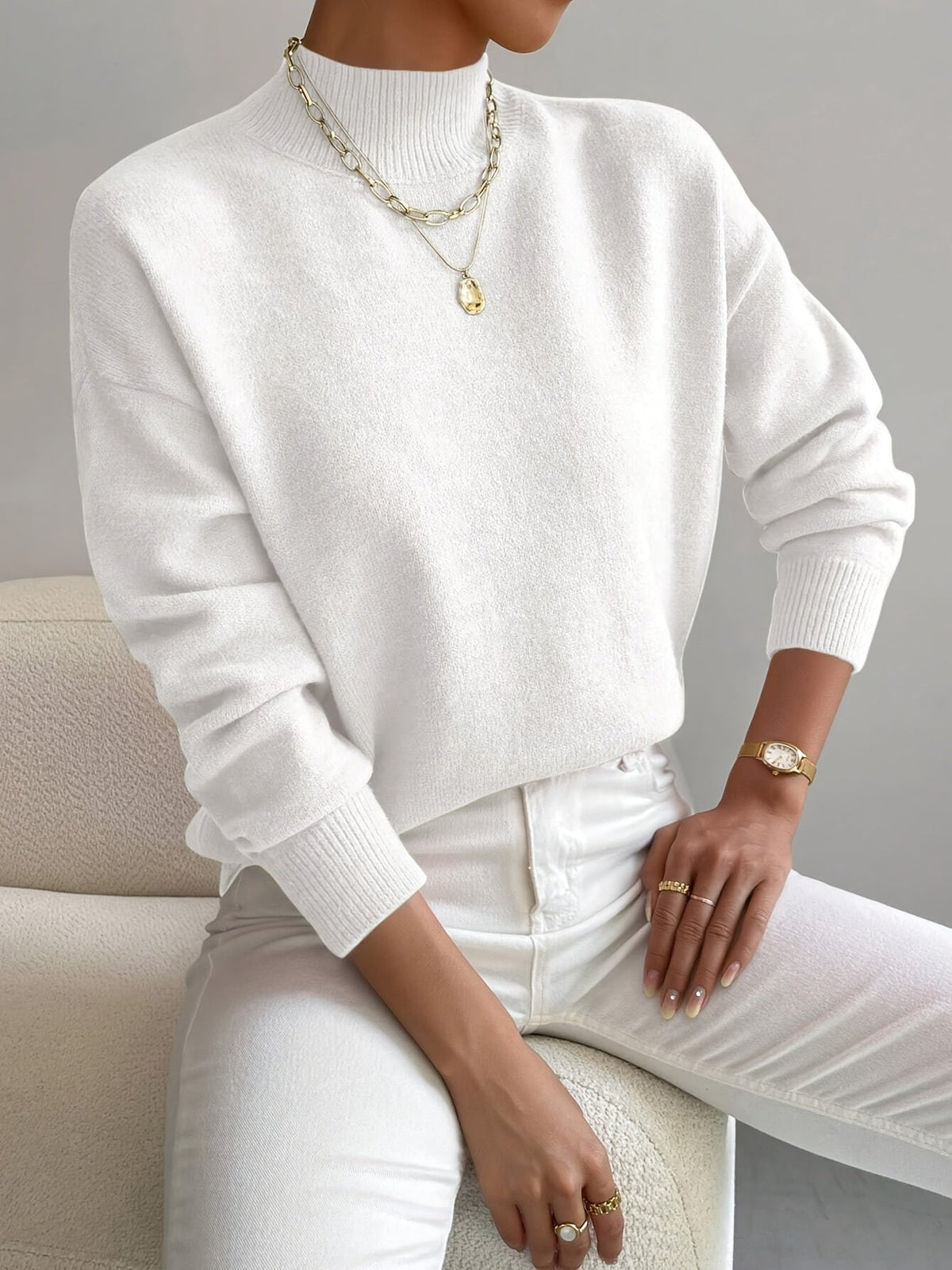 Women's long-sleeve mock neck sweater with ribbed trims