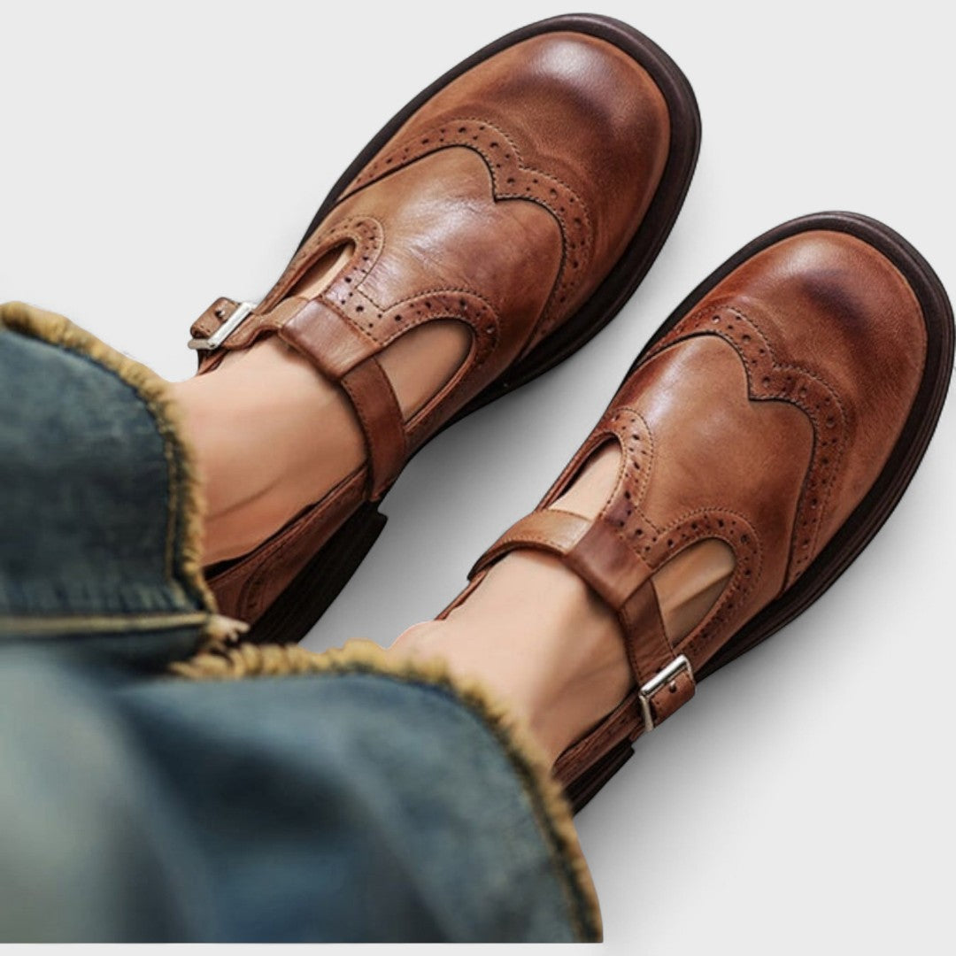 Women's Mary Jane shoes with brogue detailing, buckle straps and low block heels