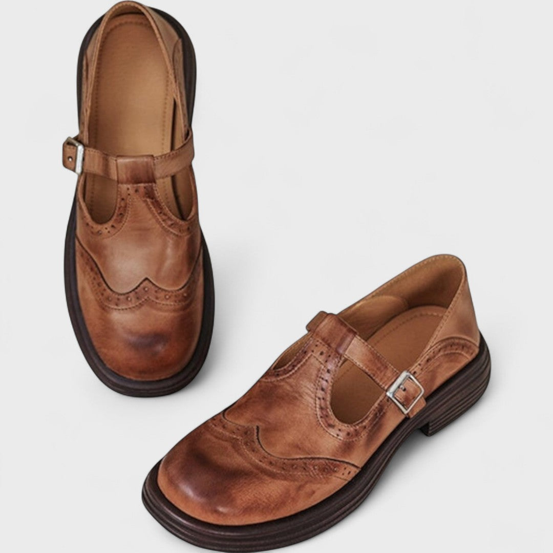 Women's Mary Jane shoes with brogue detailing, buckle straps and low block heels