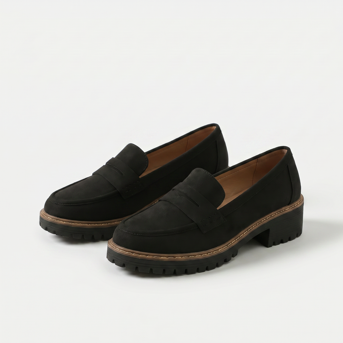 Women's platform loafers with penny straps and chunky lug soles