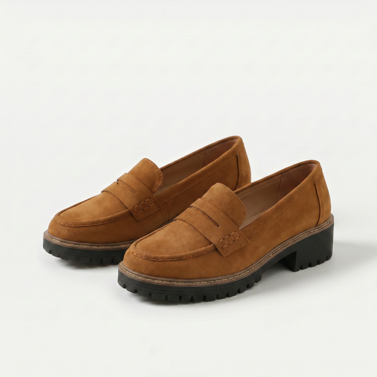 Women's platform loafers with penny straps and chunky lug soles