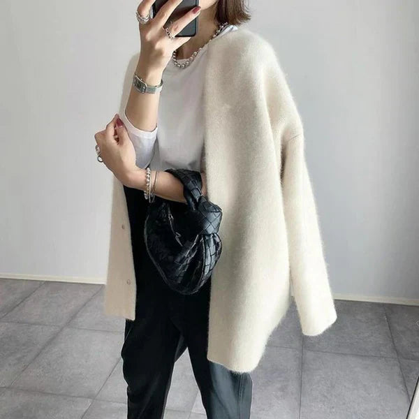 Women's longline cardigan with crew neck, long sleeves and button front