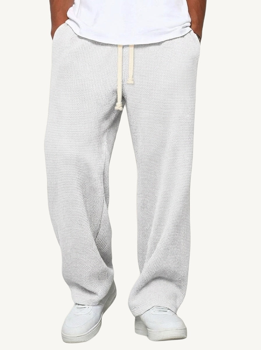 Men's relaxed wide-leg textured trousers with elasticated drawstring waist