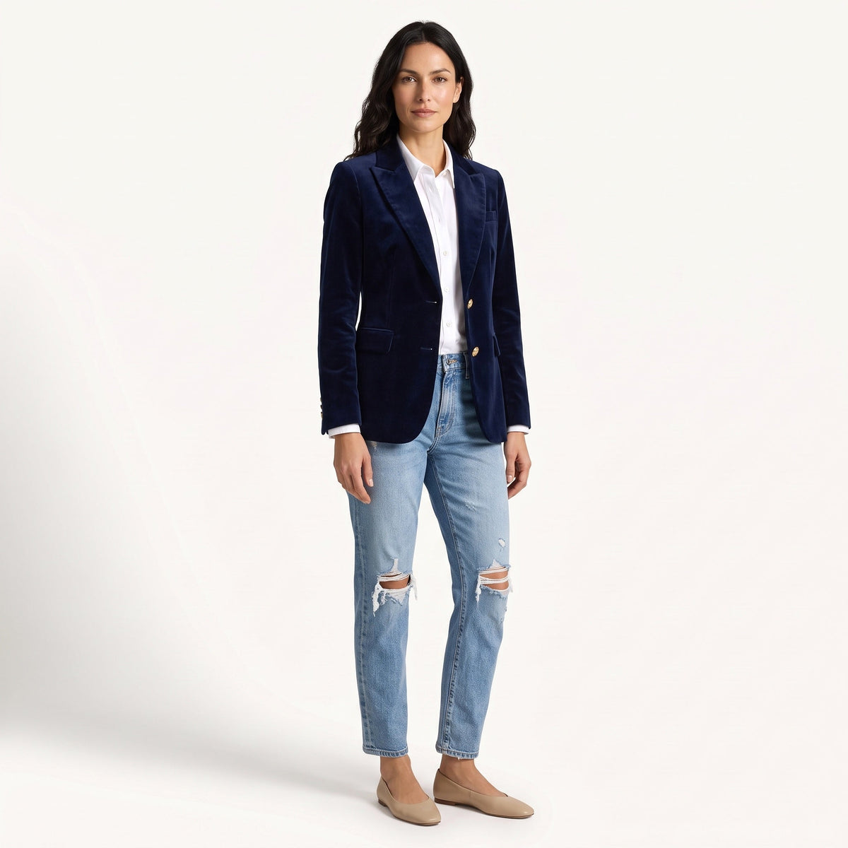Women's navy velvet blazer with notched lapels, long sleeves and flap pockets