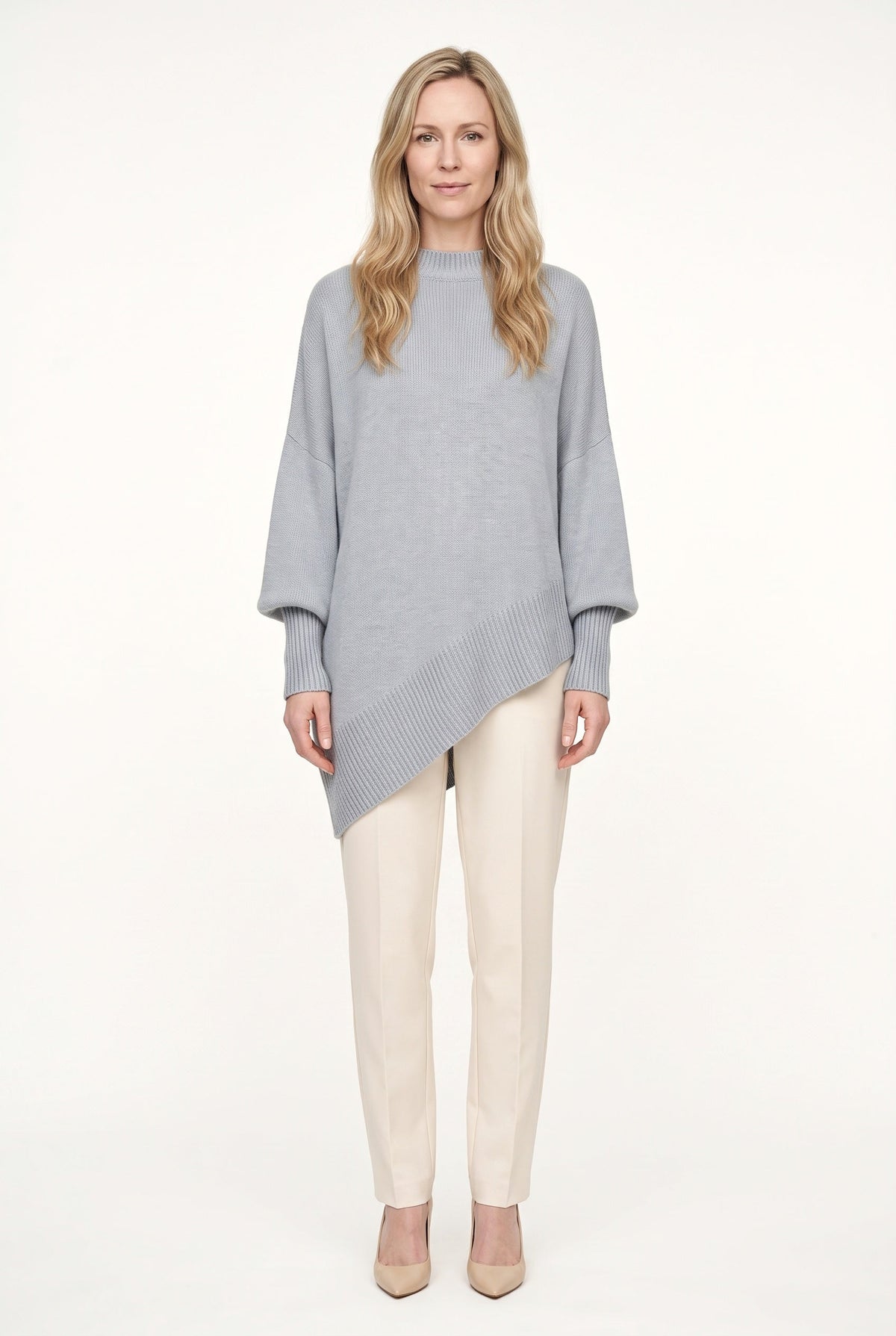 Women's oversized turtleneck sweater with long sleeves and asymmetric hem