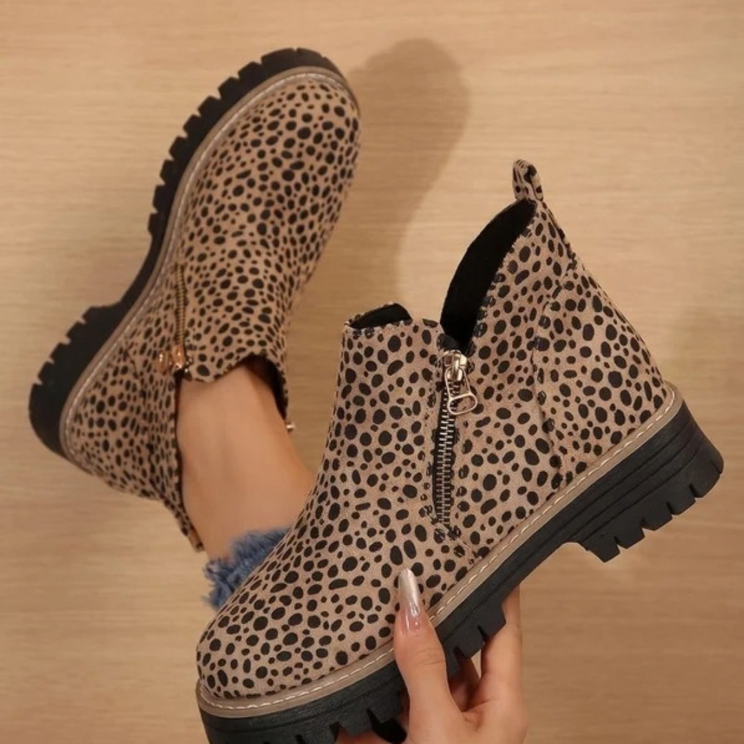 Women's ankle boots with side zips, low heels and lugged soles