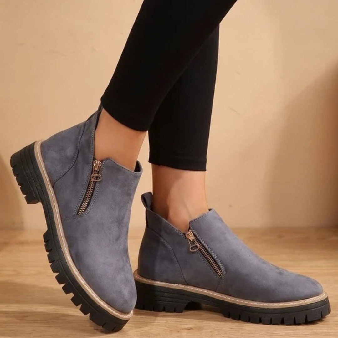 Women's ankle boots with side zips, low heels and lugged soles