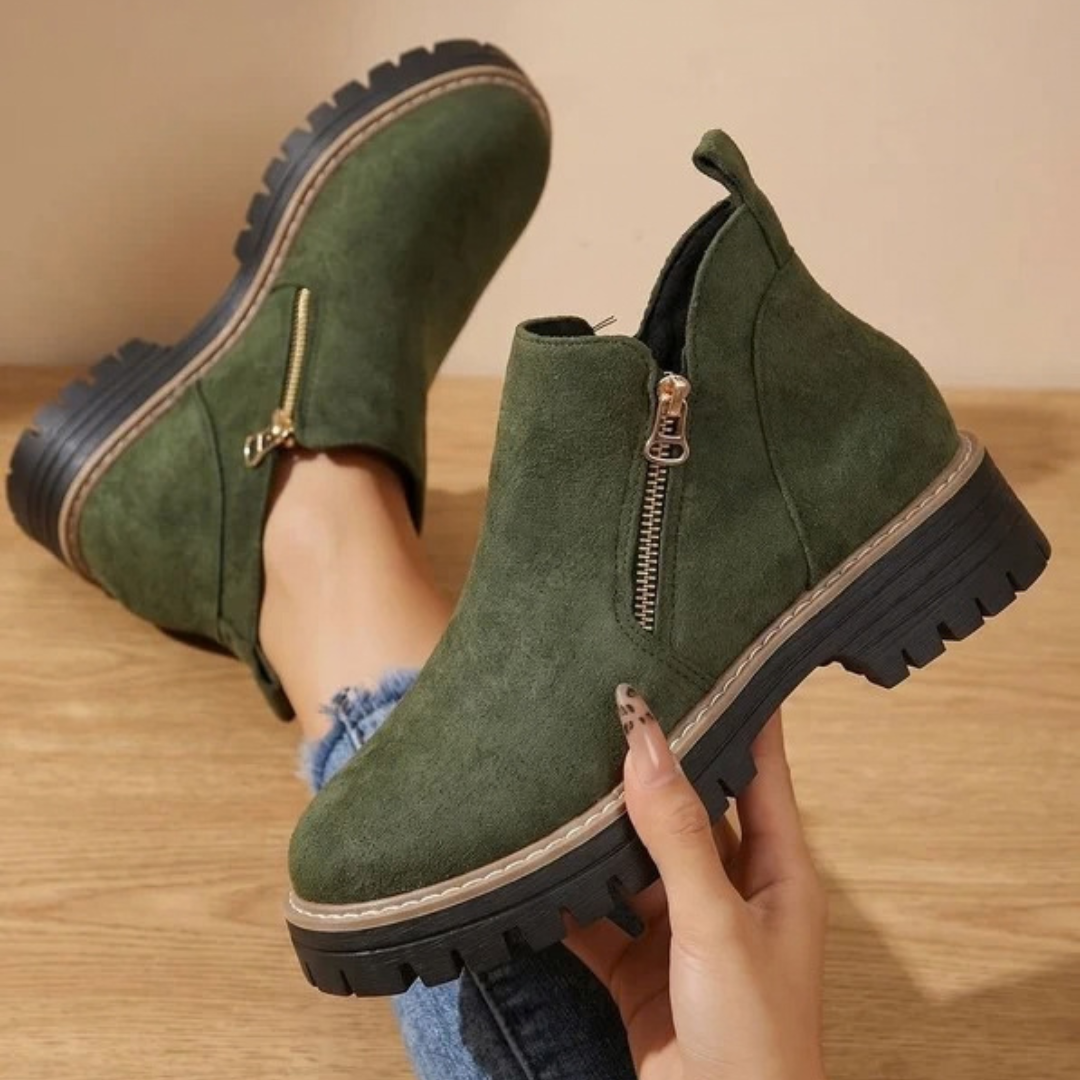 Women's ankle boots with side zips, low heels and lugged soles