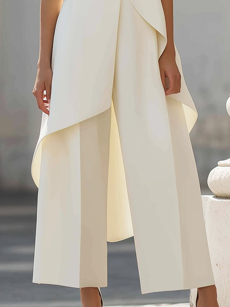Women's sleeveless asymmetric mock neck top with wide-leg trousers