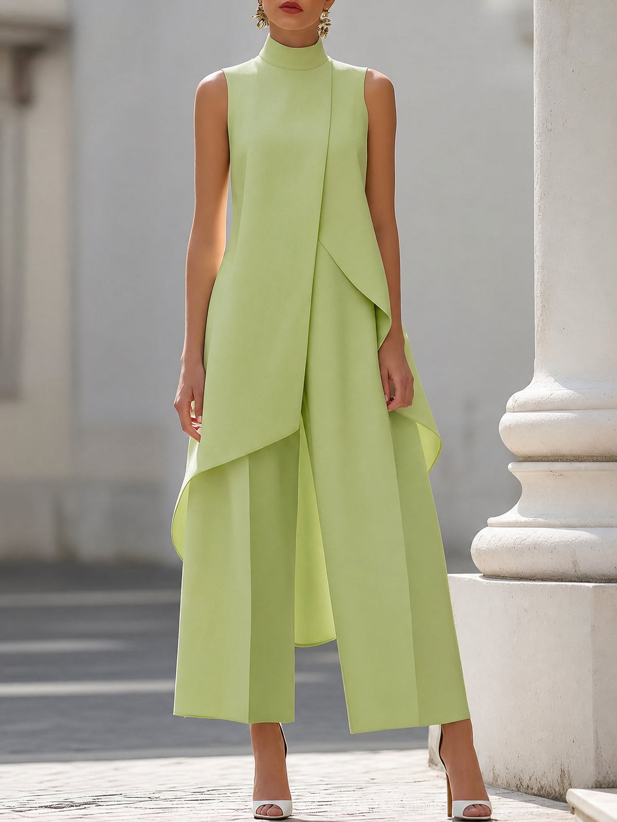 Women's sleeveless asymmetric mock neck top with wide-leg trousers
