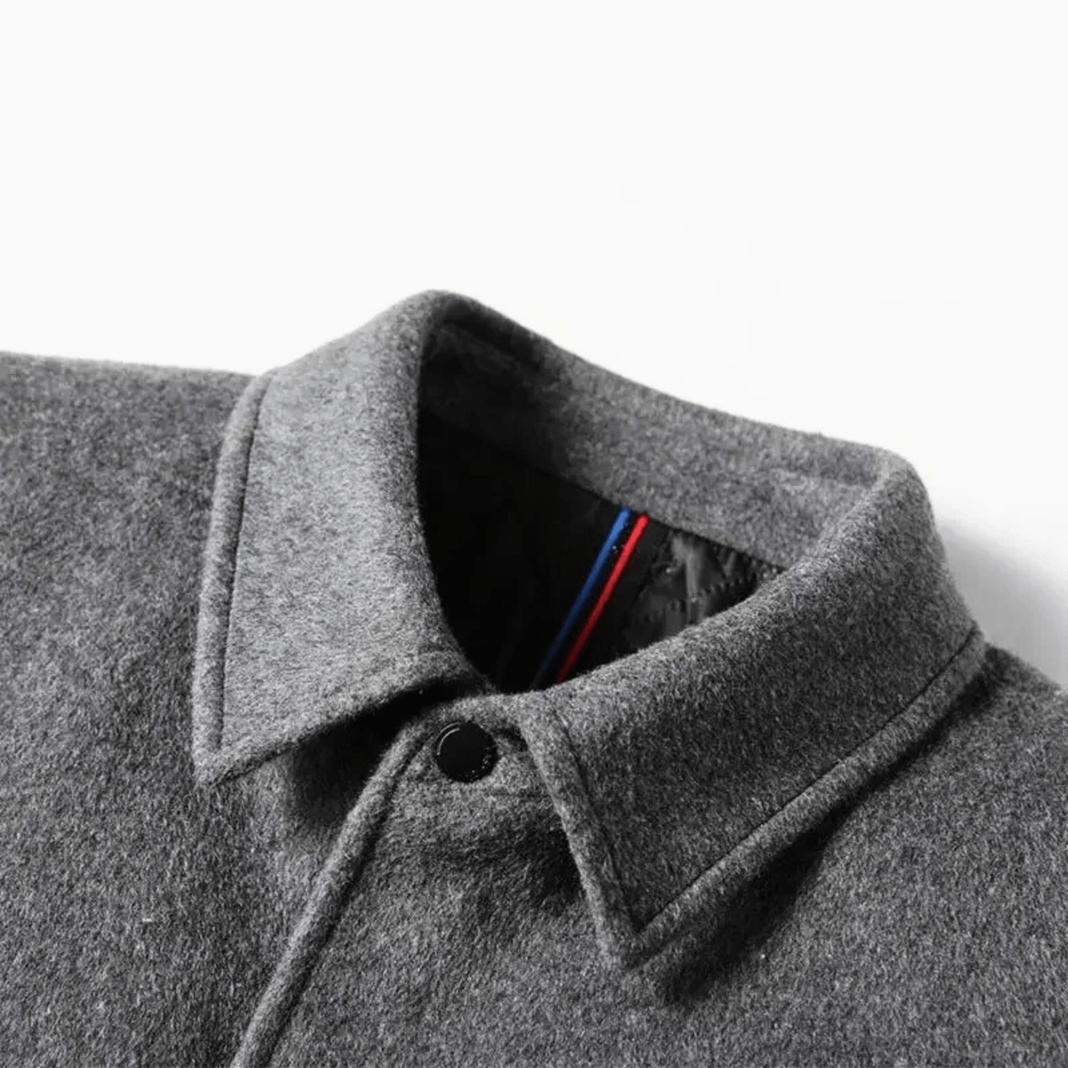 Men's tailored long coat with notched collar, button front and flap pockets