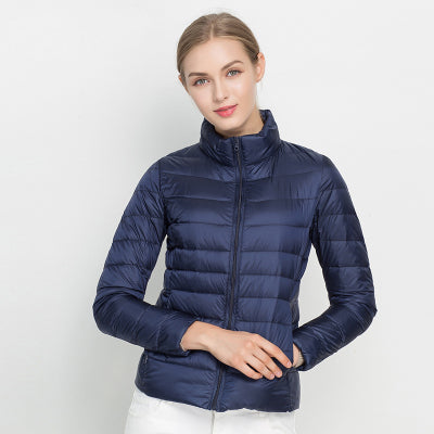 Women's quilted jacket with high collar, long sleeves and zip front