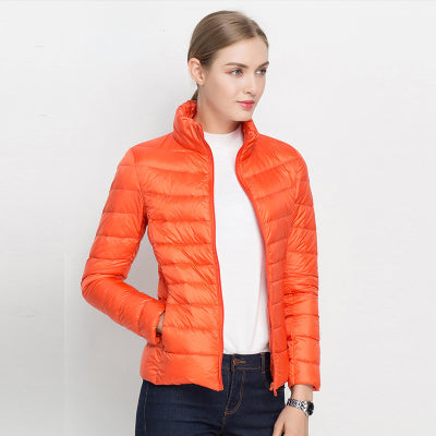 Women's quilted jacket with high collar, long sleeves and zip front