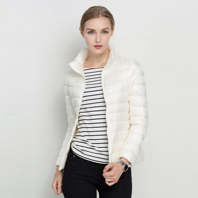 Women's quilted jacket with high collar, long sleeves and zip front