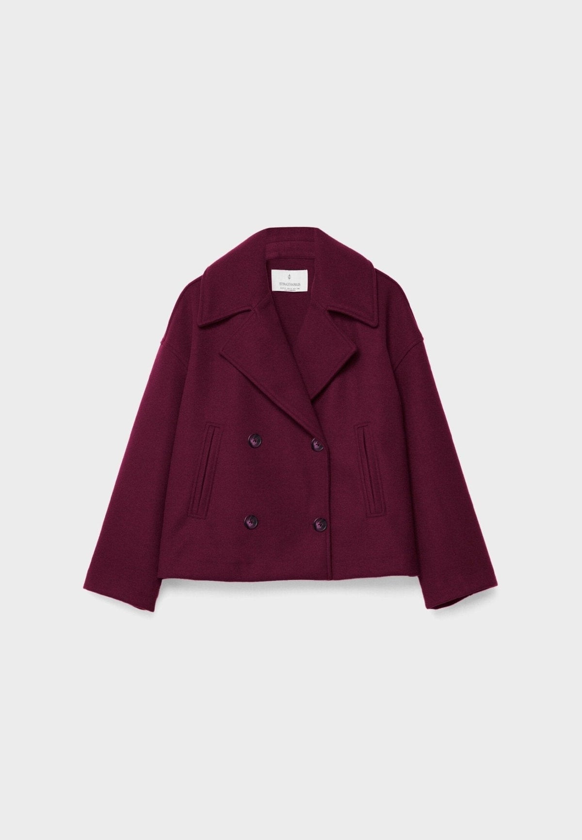 Women's cropped double-breasted jacket with wide lapels and welt pockets