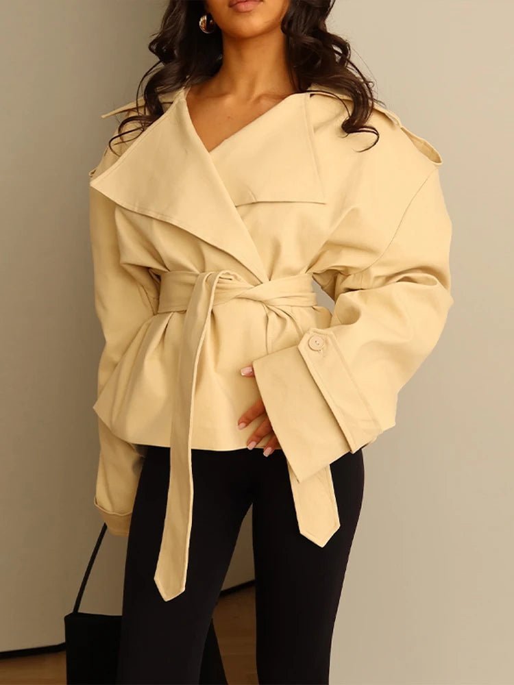 Women's cropped wrap trench coat with tie belt, lapels and long sleeves