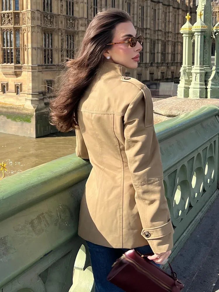 Women's beige fitted utility jacket with high neck, long sleeves and flap pockets