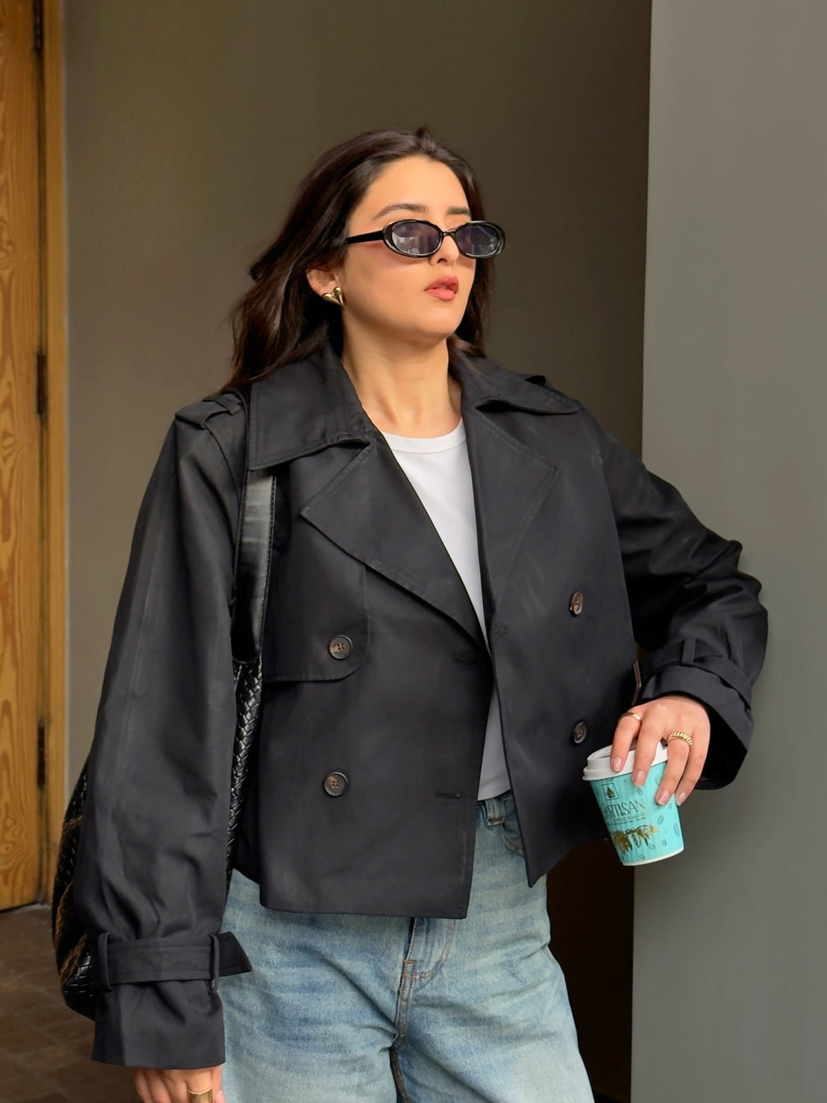 Women's cropped double-breasted trench coat with notched lapels and long sleeves